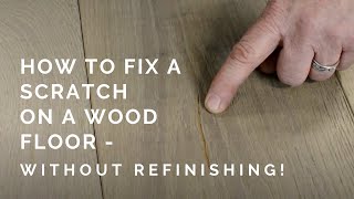 FIX A WOOD FLOOR SCRATCH WITHOUT RESANDING  Easy amp Quick DIY Hardwood Floor Scratch Repair [upl. by Ydissahc]