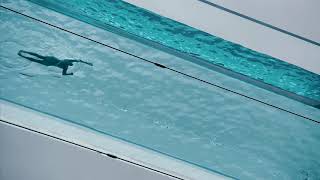 Watch a swimmer in Londons fully transparent Sky Pool [upl. by Acinelav]