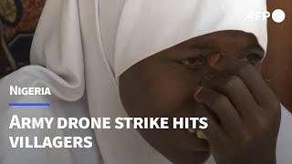 Dozens killed after Nigerian army drone strike hits villagers  AFP [upl. by Lauritz145]