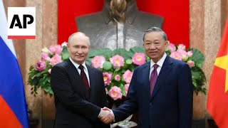 Russias Vladimir Putin greeted by Vietnamese President To Lam [upl. by Slocum]