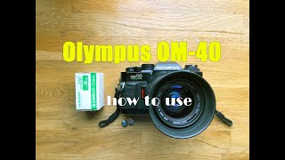 Olympus OM40 35mm Film Camera How to load a film and use [upl. by Aihtnis319]