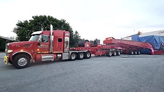 Trans American Peterbilt 567 Hauling Stator Gross 487000 Lbs 23 Axles 235 ft Long Kenworth Pusher [upl. by Nitsoj]