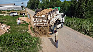 Start a new project Filling Land by Dump truck unloading soil With Mini Bulldozer [upl. by Ailes]