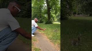 Guy Using a Waving Hand to Attract a Squirrels Attention [upl. by Miett]