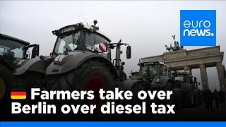 Angry German farmers drive their tractors to Berlin over diesel tax  euronews 🇬🇧 [upl. by Wrdna]