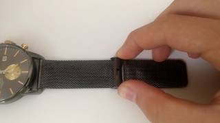 How to Adjust a Watch Clasp on a Metal Mesh Strap [upl. by Latoya66]