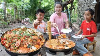 Yummy spicy seafood noodle soup cooking and eating  Mom and children cooking [upl. by Ahker359]