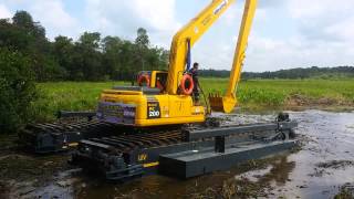 LAUNCHING amphibious excavator swamp KOMATSU PC200 8 LC long arm part 1 [upl. by Ludvig]