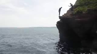 High Diving into sea at Hindu Caves Torquay Devon [upl. by Odnam]