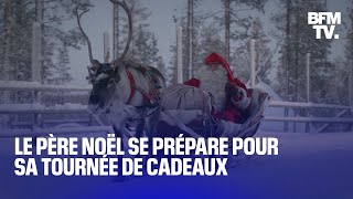 Le Père Noël s’affaire aux derniers préparatifs avant sa tournée annuelle de distribution de cadeaux [upl. by Auqkinahs355]