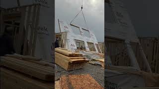 Exterior Wall installed framing construction timelapse cranelifting carpentry [upl. by Kudva624]