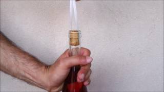 How to Remove Cork and Cork Tiles From Bottle With String Hook [upl. by Nirehtac]