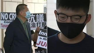 Hong Kong Joshua Wong Jimmy Lai arrive in court  AFP [upl. by Ertnod]