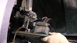 Raybestos Best Brake Job Removing Brake Assembly [upl. by Anilra757]