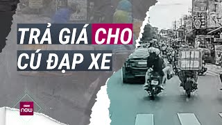 Đạp người chở hàng ngã sõng soài trên đường Hành vi côn đồ sẽ bị xử lý ra sao  VTC Now [upl. by Haberman959]