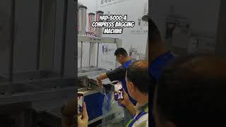 Sponge sofa cushions compress packing machine compression bagging machine HFD5000A packing [upl. by Yrtnej]