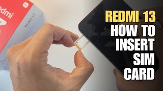 How to Install a SIM Card to Xiaomi Redmi 13 [upl. by Earezed]