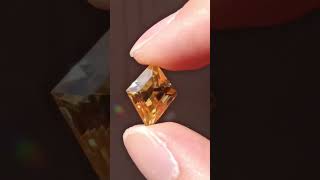 A brilliant and rare scheelite gemstone cut in a rhombus shape gem scheelite crystals [upl. by Hnamik]