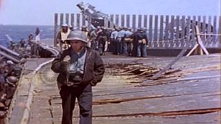 Damage on USS Bunker Hill after it was attacked by a suicide aircraft while underHD Stock Footage [upl. by Ahsiloc258]