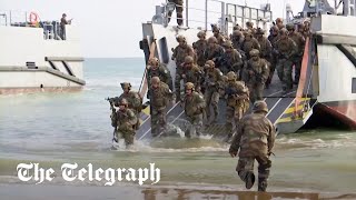 French soldiers hold DDay reenactment as 80th anniversary nears [upl. by Genesa254]