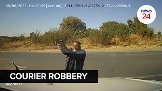 WATCH  Shootout between police and suspects robbing a courier vehicle [upl. by Ananna757]