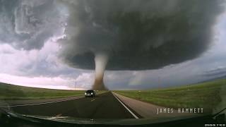 Storm chasing dashcam Tornado crossing the highway Laramie Wyoming [upl. by Ecneralc]