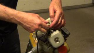 How to Change a Gas Trimmer Spark Plug and Filter [upl. by Sommers]