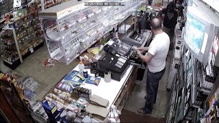 Armed robbery surveillance footage from Triangle Market [upl. by Somerville]