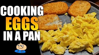 Making eggs in stainless steel pan [upl. by Ibrab]