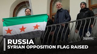 Syrias opposition flag raised at the embassy in Russia [upl. by Gnehs]