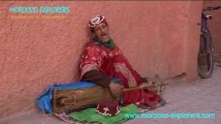 Marrakech Gnawa street performer singing traditional song [upl. by Barrada294]