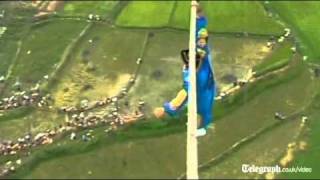 Acrobat falls off tightrope in death defying high wire stunt gone wrong [upl. by Currie717]