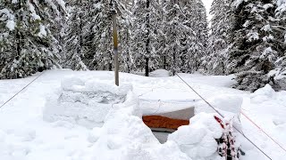 Winter Camping In Snow Shelter During A Storm [upl. by Assilam587]