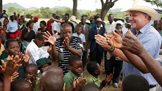 Celebration in Zimbabwe as a white farmer returns to seized land [upl. by Merrill626]