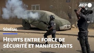 Sénégal  affrontements entre manifestants et forces de sécurité à Dakar  AFP Images [upl. by Zetroc]