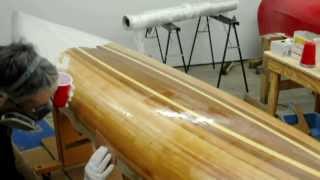 Fiberglassing a wooden kayak hull [upl. by Acinorev]