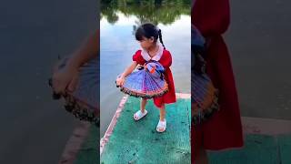 This little girl catches fish with a net 😳😱 [upl. by Naej]