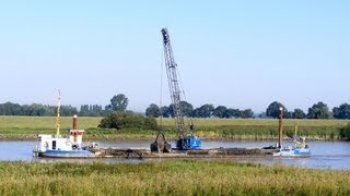 Baggerschiff quotLemsterlandquot auf der Ems  Dredger quotLemsterlandquot on the river Ems [upl. by Atiuqcir]