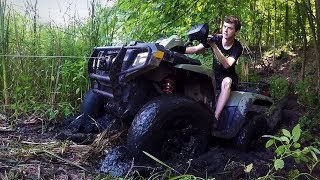 STUCK IN THE MUD amp BREAKING THE WINCH Lifted Polaris Sportsman 800 4x4 OffRoading [upl. by Enyal491]