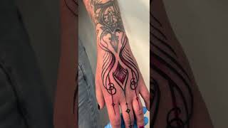 Ornamental hand tattoo [upl. by Annawahs60]