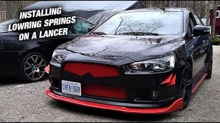 Installing lowering Springs On My Buddys Lancer [upl. by Enyad716]