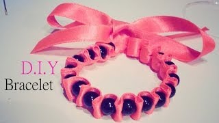 Création DIY Le bracelet ruban et perles comment faire tuto [upl. by Leia]