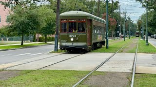 Streetcars travel along St Charles Ave in Garden District in New Orleans neworleans streetcars [upl. by Alleram]