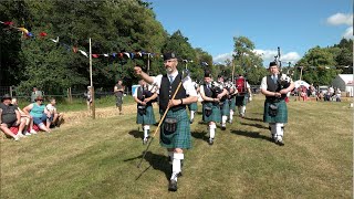 Drum Major leads Newtonhill Pipe Band playing Green Hills on the march at 2023 Drumtochty Games [upl. by Nnadroj]