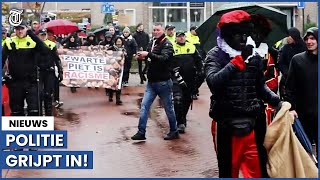 Politie grijpt in na confrontatie tussen zwarte pieten en KOZP [upl. by Raycher946]