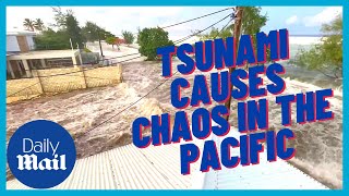 Tsunami waves after underwater volcano cause chaos across Pacific [upl. by Sinaj]