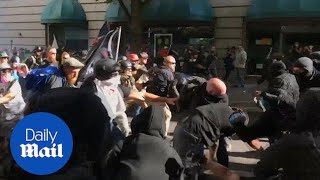 Fight breaks out between opposing protests in Portland [upl. by Lovering]