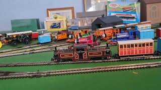 Bachmann Double fairlie pulling red and 3 blue coaches with Red box van [upl. by Aronle855]