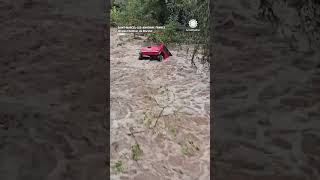 Mini Cooper Bobs Downstream During France Flooding [upl. by Aokek641]