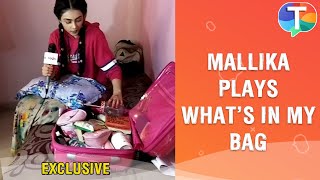 Mallika Singh aka Radha plays the fun segment Whats in my bag  Exclusive [upl. by Akoyn]